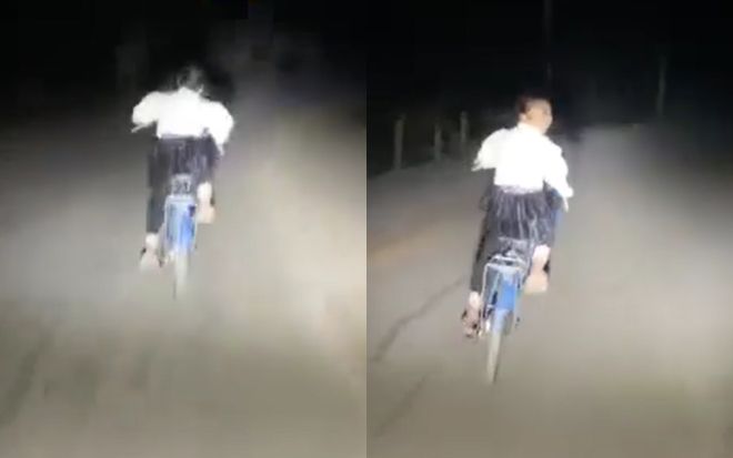 Có lòng tốt soi đèn giúp em nhỏ đạp xe về khuya, tài xế liền cười trừ trước phản ứng bất ngờ của cô bé