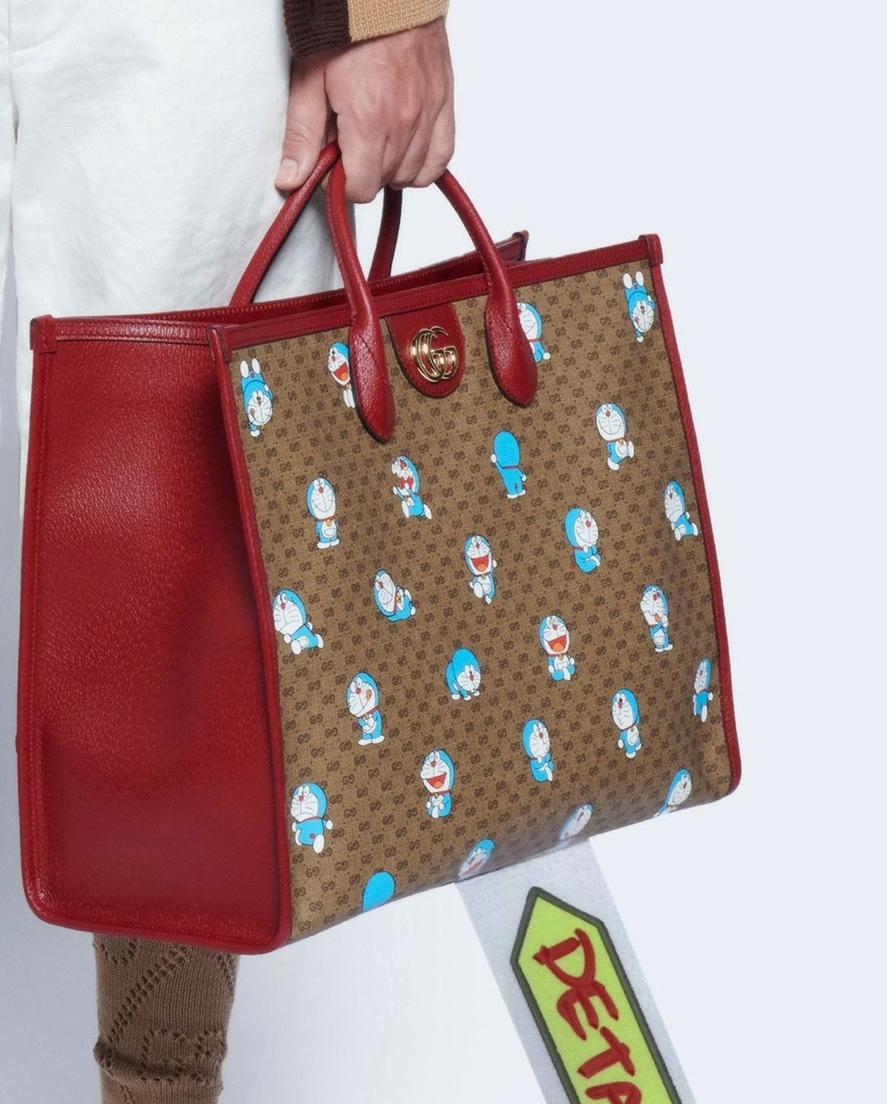 Gucci in hình Doraemon lên túi xách, quần áo bán giá ngàn đô Ảnh 4