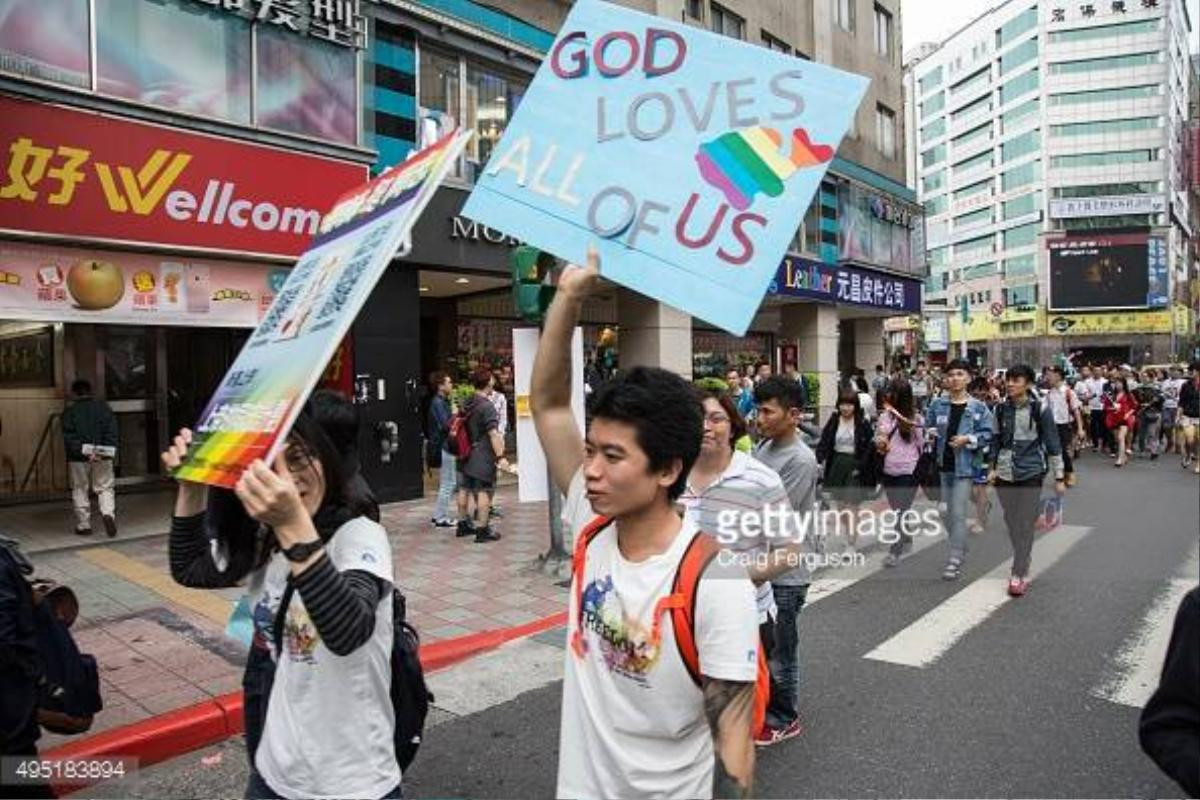 TAIPEI, TAIWAN - 2015/10/31: Church and religious groups march in support for homosexual rights at the LGBT Pride Parade. Upwards of 60 000 people took to the streets of Taipei for the annual Pride march, the largest such event in Asia. Taiwan is often said to be the likeliest Asian nation to legalize gay marriage. (Photo by Craig Ferguson/LightRocket via Getty Images)