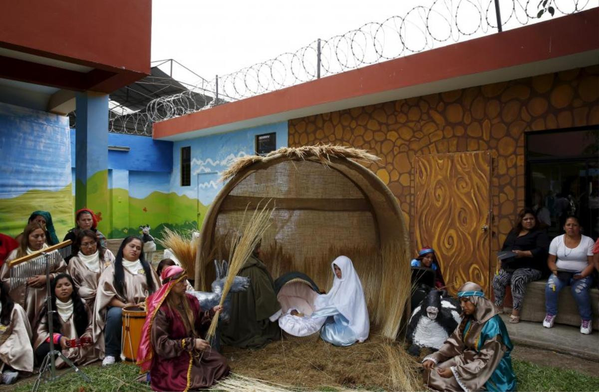 Inmates in costumes perform the birth of Jesus ahead of Christmas at Sarita Monica female prison in Lima, Peru, December 21, 2015. At the event inmates stage the birth of Jesus and celebrated the end of the school year for children. Inmates who are mothers are permitted to have their children stay in prison with them till they are 3 years old. Forty-four children live together with their mothers inside the prison, according to the press released by the Penitentiary Institute. REUTERS/Mariana Bazo