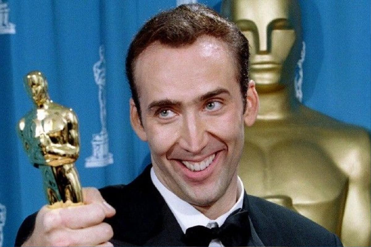 Actor Nicolas Cage gives holds his Oscar statuette after winning an Academy Award as best actor for his role in "Leaving Las Vegas" at the 68th Academy Awards telecast in Los Angeles, March 25 - RTXGW45