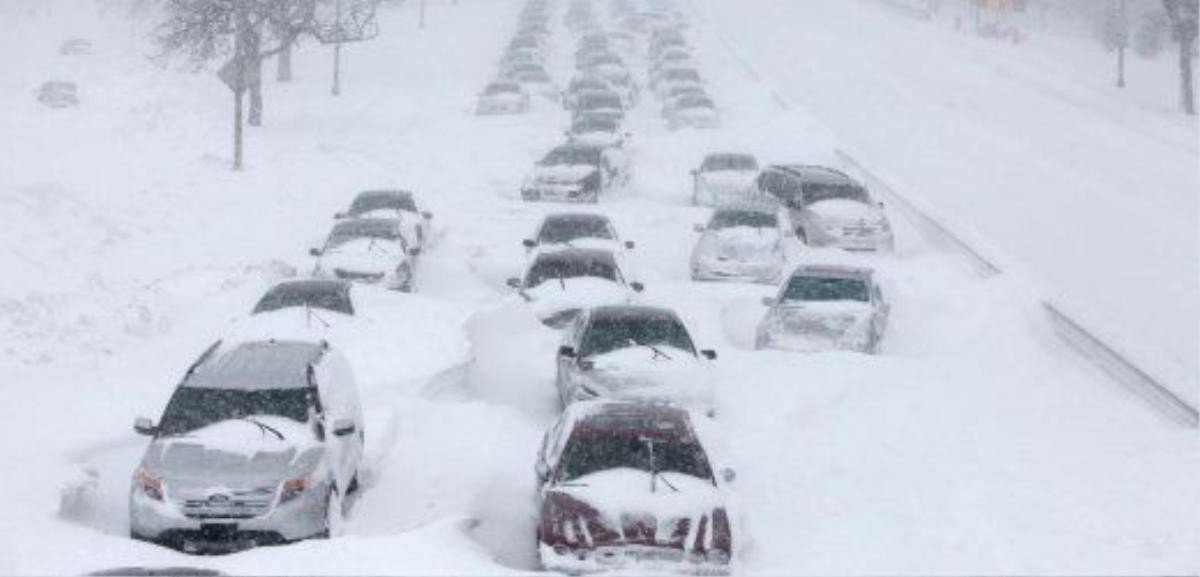 Hundreds of cars are seen stranded on Lake Shore Drive Wednesday, Feb. 2, 2011 in Chicago. A winter blizzard of historic proportions wobbled an otherwise snow-tough Chicago, stranding hundreds of drivers for up to 12 hours overnight on the city's showcase lakeshore thoroughfare and giving many city schoolchildren their first ever snow day. (AP Photo/Kiichiro Sato)