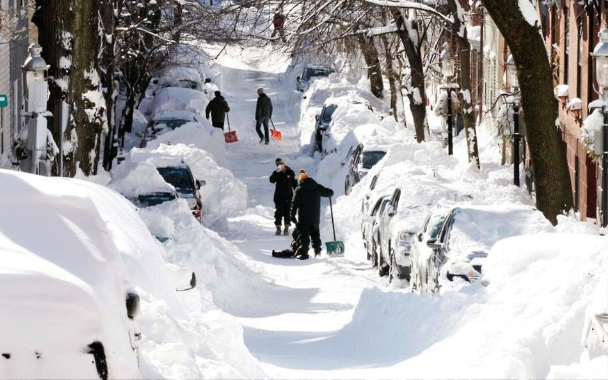 17 jonas Residents dig out their cars on a street in Boston