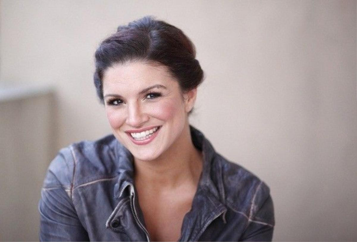 Mixed Martial Arts (MMA) fighter and actress Gina Carano poses for a portrait while promoting the film "Haywire" in Beverly Hills, California, January 7, 2012. REUTERS/Danny Moloshok (UNITED STATES - Tags: ENTERTAINMENT SPORT) - RTR2W0L4