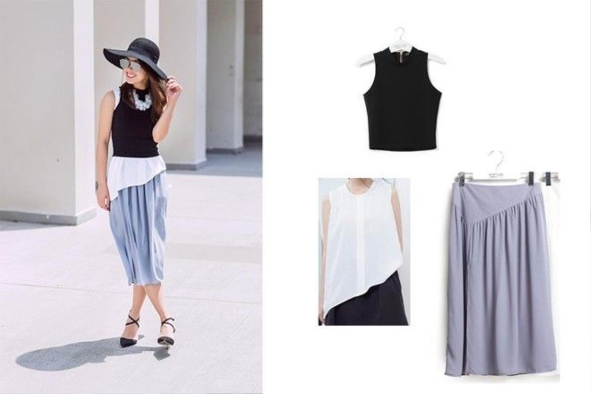 Cả set bao gồm áo đen crop top mặc bên ngoài áo blouse trắng tạo layer vận cùng váy xám.