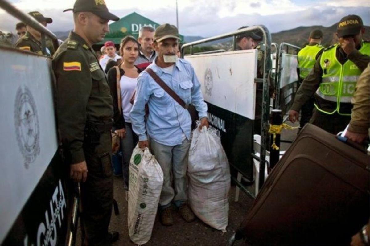 doi-nguoi-venezuela-un-un-tran-qua-bien-gioi-sang-colombia_1