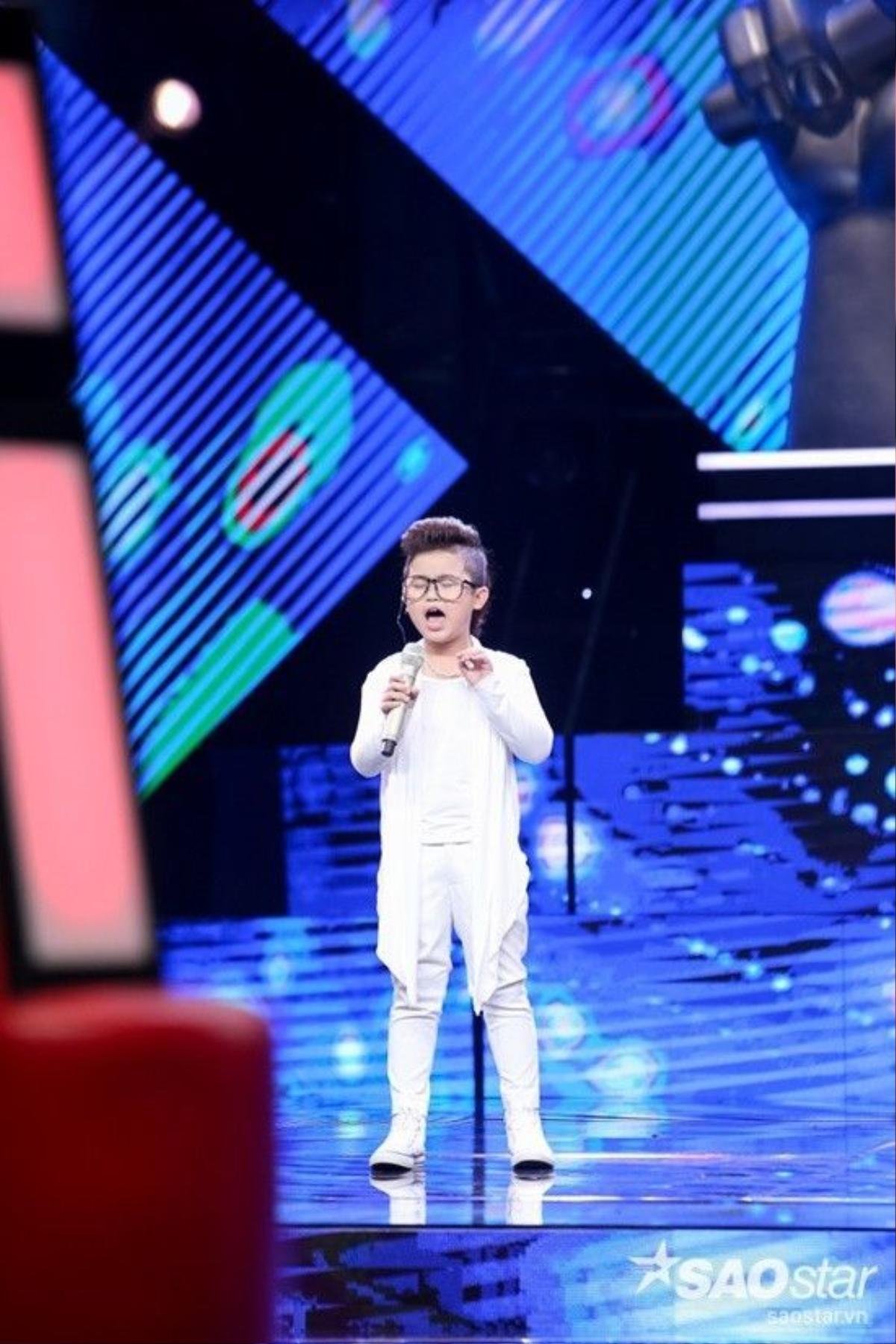 Hot boy nhí Chu Tuấn Ngọc gây sốt khi tham gia chương trình The voice Kids 2014.