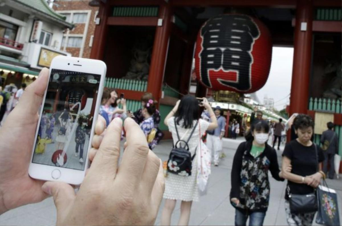 in-tokyo-someones-trying-to-catch-a-pikachu-at-the-sensoji-temple-in-the-asakusa-district