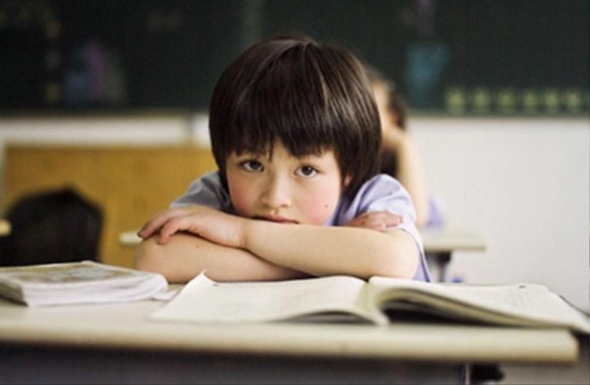 Bored Student in Classroom --- Image by © Michael Prince/Corbis