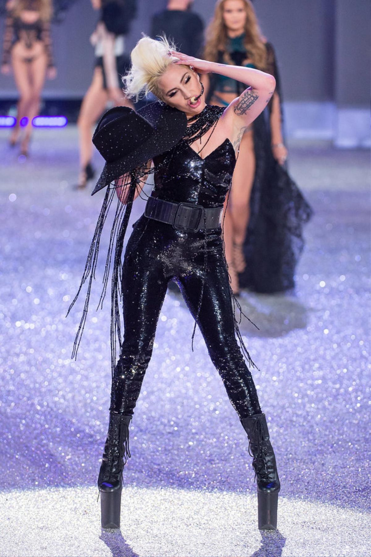 PARIS, FRANCE - NOVEMBER 30: Singer Lady Gaga performs during the runway during the 2016 Victoria's Secret Fashion Show at Le Grand Palais in Paris on November 30, 2016 in Paris, France. (Photo by Michael Stewart/FilmMagic)