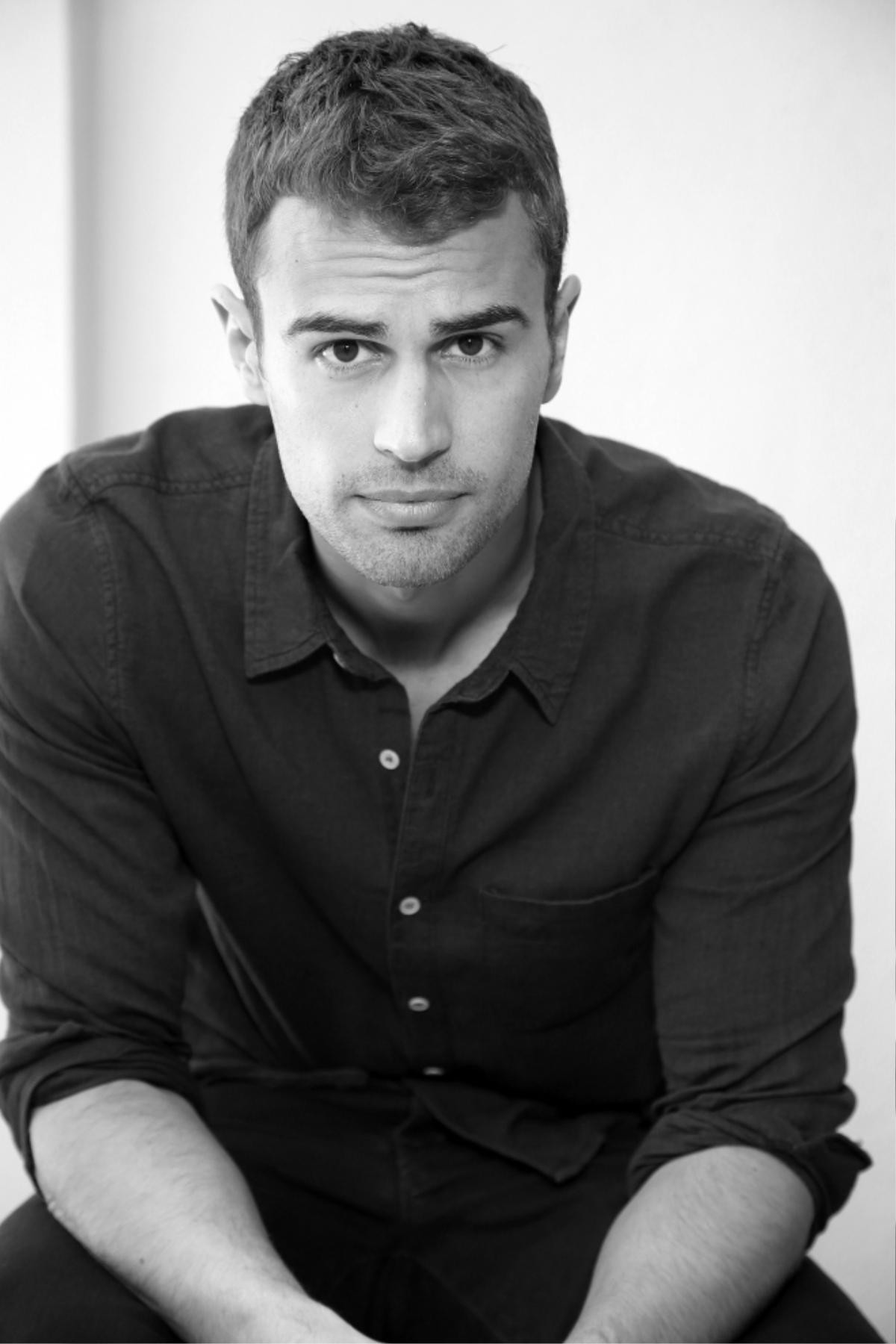 In this Saturday, March 8, 2014 photo, actor Theo James poses for a photo in Beverly Hills, Calif. The soulful Brit James, the star of the buzzed about “Divergent,” is being set up as Hollywood next heartthrob. The film adaptation of Veronica Roth’s sci-fi best-seller hits theaters on Friday, March 21, 2014. (Photo by Annie I. Bang /Invision/AP)