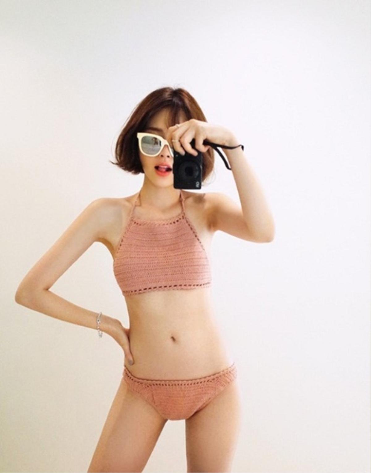 Còn lâu hè mới tới nhưng Instagram các mỹ nhân Việt đã tràn ngập những shoot hình diện bikini nóng bỏng Ảnh 15