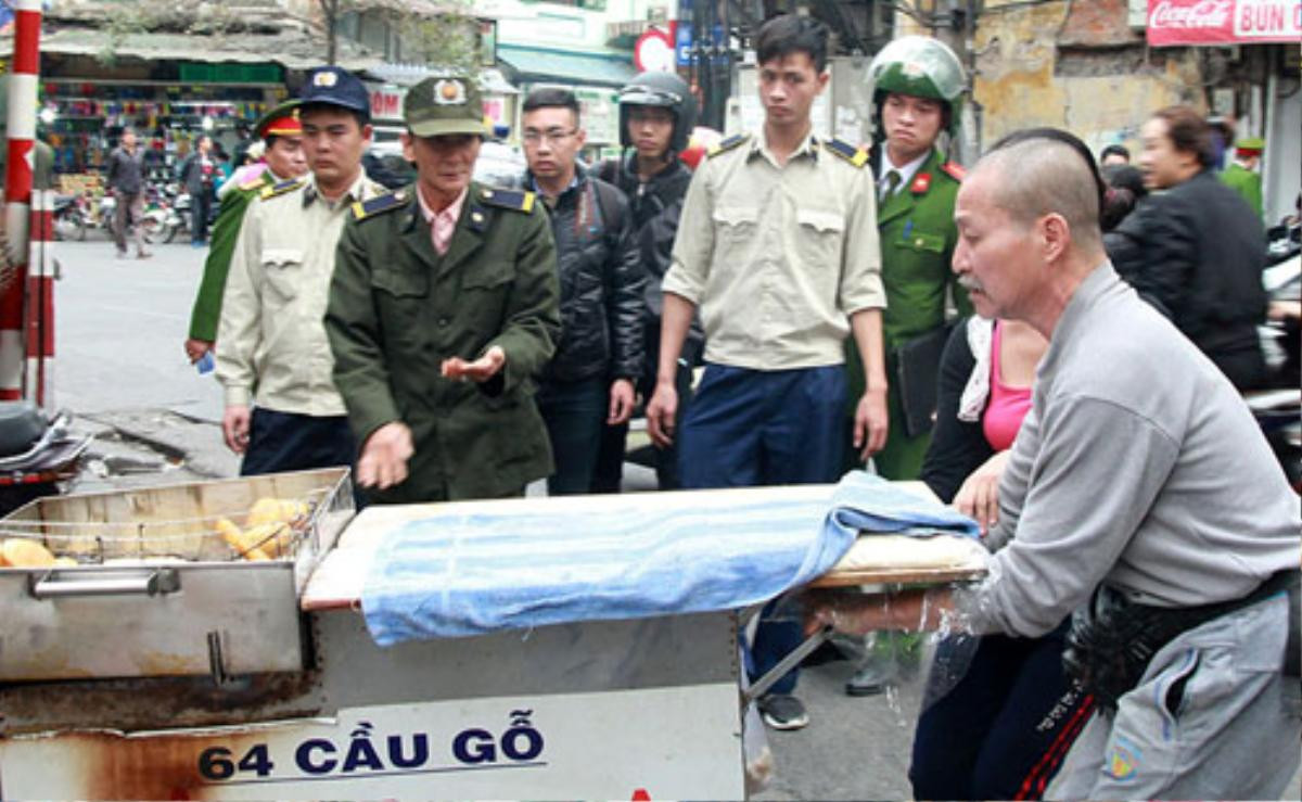 Cuộc chiến giành lại vỉa hè: 'Hà Nội không học quận 1' Ảnh 2