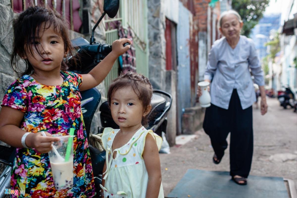 Những người cuối cùng ở 'khu ổ chuột' sắp bị giải toả giữa Sài Gòn Ảnh 19