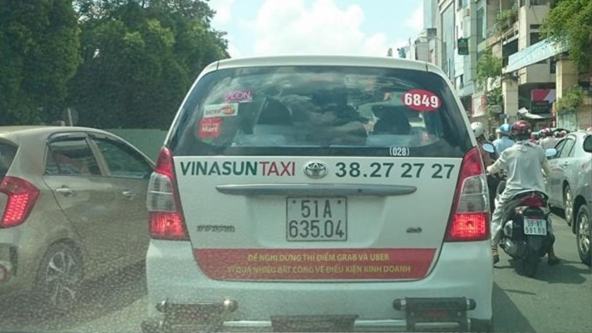 Việc Vinasun dán băng rôn trên taxi có thể bị xử lý về tội gây rối trật tự Ảnh 3