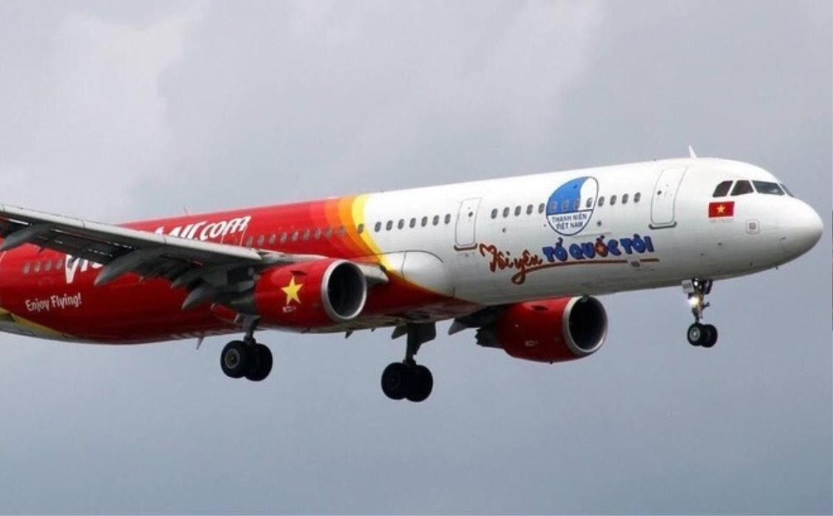 Chuyên cơ 'Tôi yêu Tổ quốc tôi' của Vietjet đón đội tuyển U23 Việt Nam về nước Ảnh 1