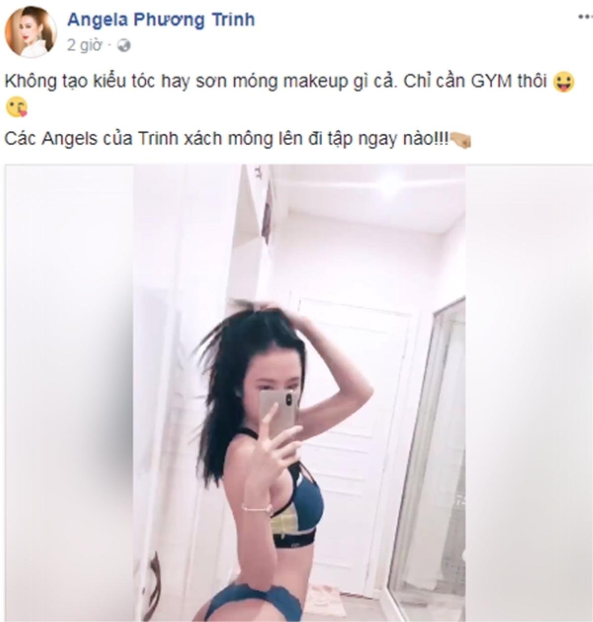 Bị nghi photoshop quá đà, Angela Phương Trinh tung clip khoe vòng 3 'bốc lửa' Ảnh 1