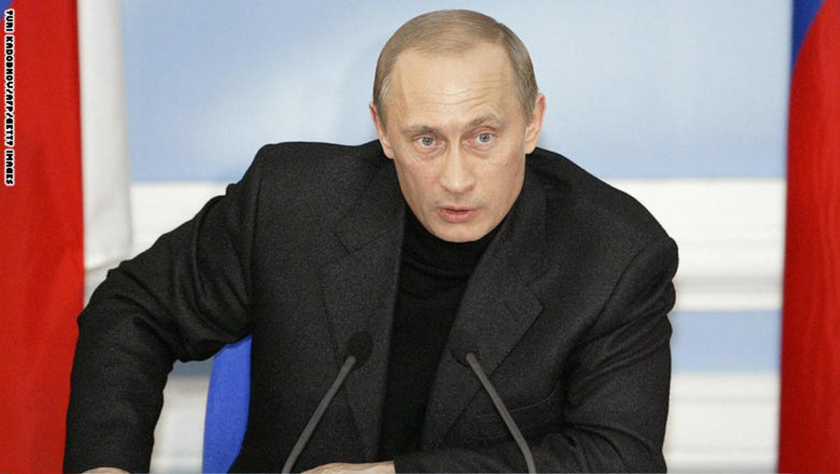 Tổng thống Putin qua 18 năm lãnh đạo Nga: Ngày càng trẻ trung và phong độ Ảnh 7