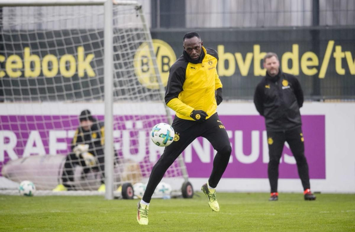 Chùm ảnh: Buổi tập đầu tiên của 'tia chớp' Usain Bolt tại Borussia Dortmund Ảnh 6