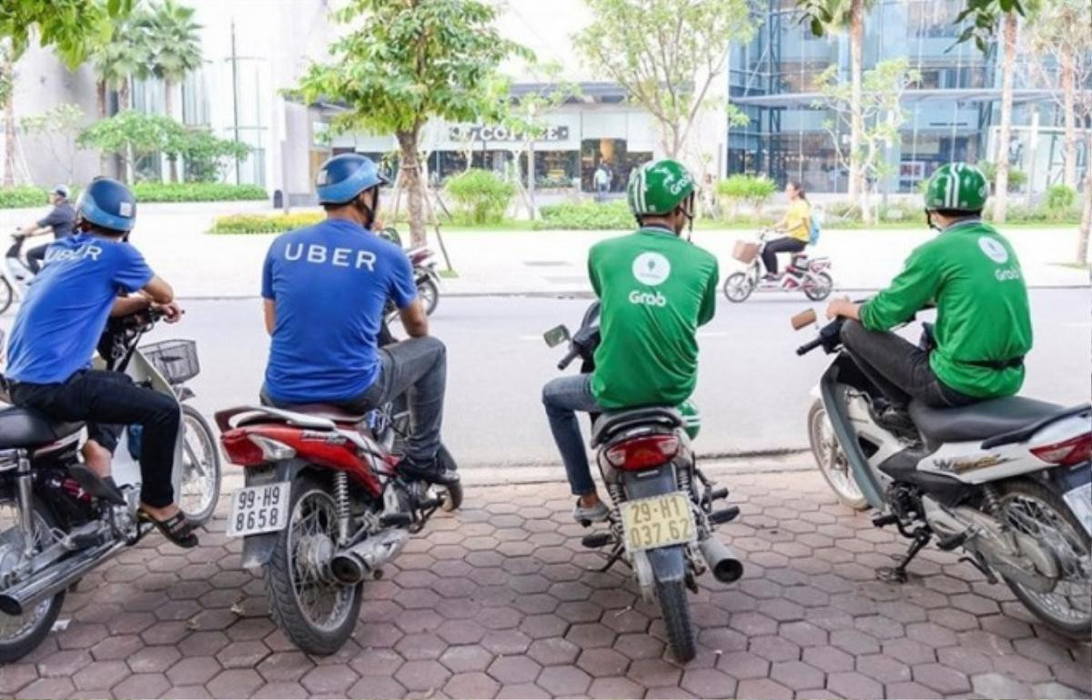 Trước ngày Uber sáp nhập vào Grab: Người tiêu dùng hoang mang, lái xe 2 hãng lo lắng chuyện độc quyền Ảnh 4