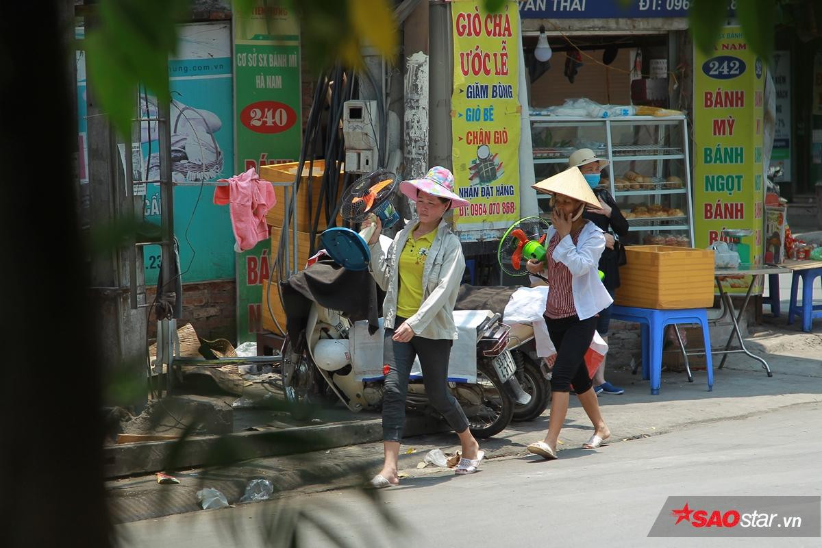 Mới đầu hè người Hà Nội đã bị ám ảnh vì nắng nóng, cứ ra đường là thấy cả một thế giới ninja Ảnh 11