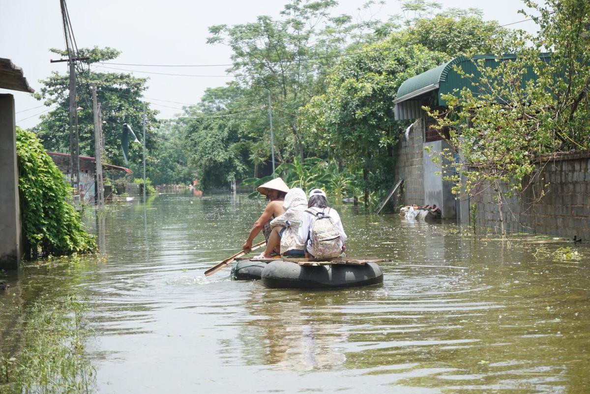 Chùm ảnh nước đê tả Bùi rút mạnh, hàng vạn người dân ở Hà Nội tạm thời qua cơn nguy cấp Ảnh 16