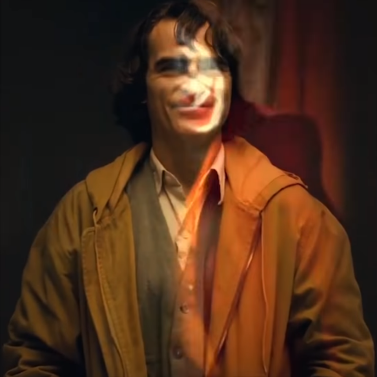 DC tung clip hậu trường 'The Joker', hé lộ tạo hình 'hề điên' của Joaquin Phoenix Ảnh 8