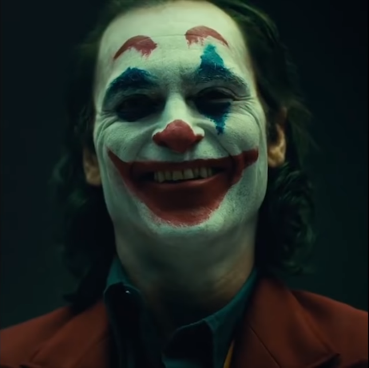 DC tung clip hậu trường 'The Joker', hé lộ tạo hình 'hề điên' của Joaquin Phoenix Ảnh 9