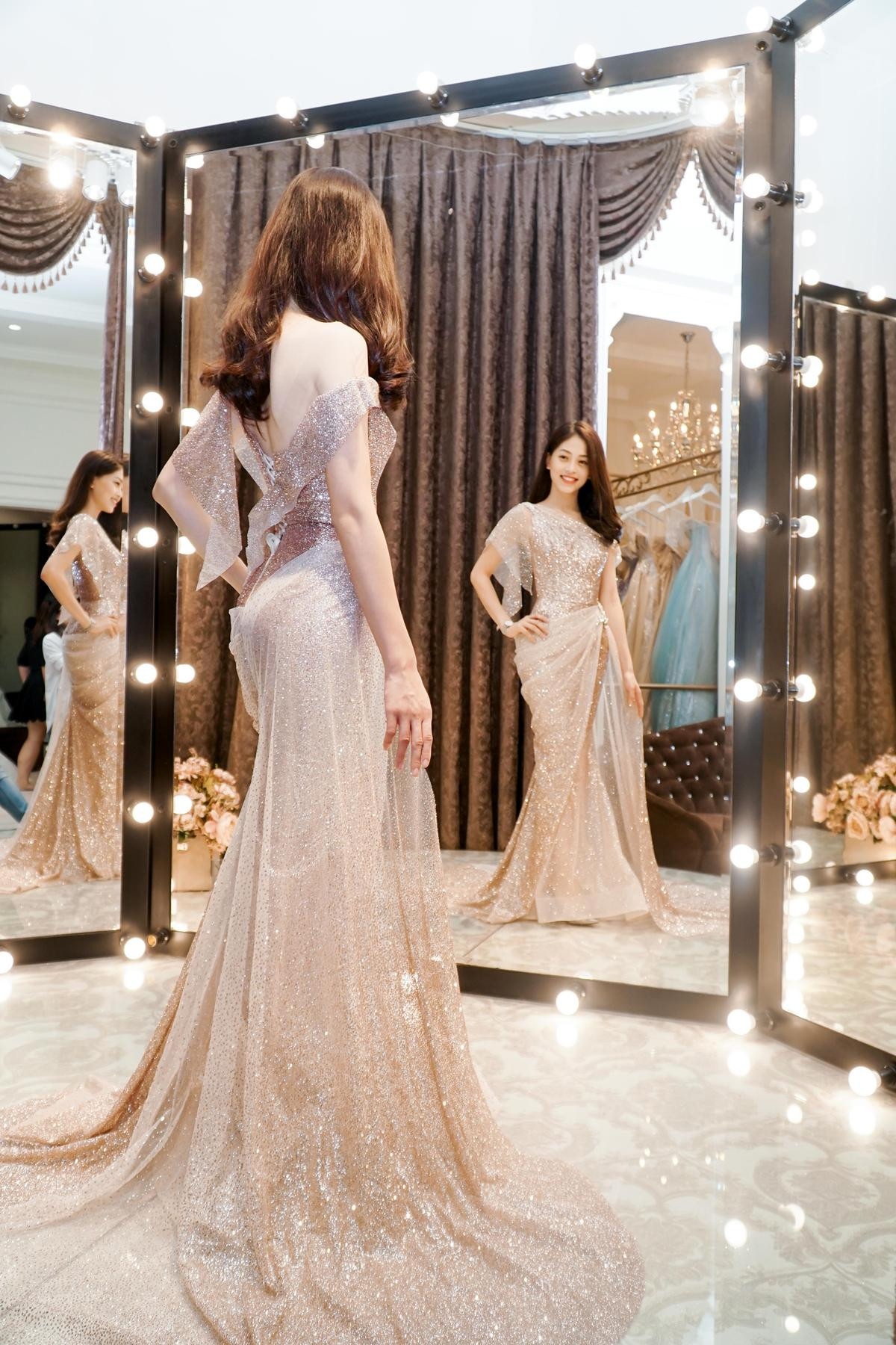 Á hậu Phương Nga xinh đẹp không góc chết khi đi chọn váy áo chuẩn bị cho Miss Grand International 2018 Ảnh 1