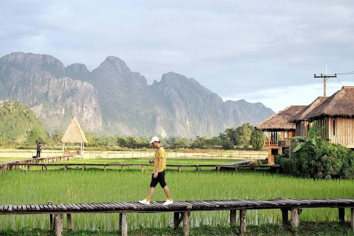 Ngất ngây cây cầu gỗ giữa đồng ruộng xanh rì khiến người ta phải thốt lên: Lào đẹp đến thế này ư? Ảnh 21