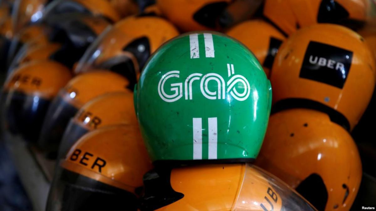 Grab liên tiếp bị xử phạt tiền tỷ tại Việt Nam Ảnh 1