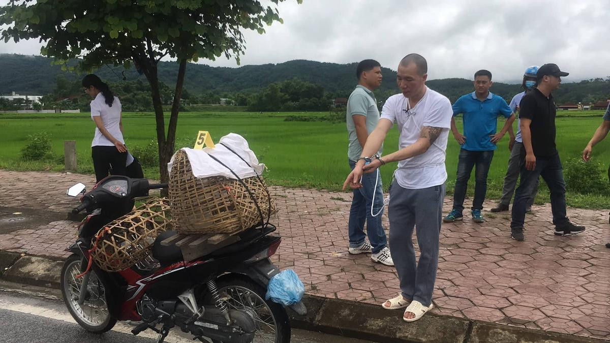 Cận mặt nghi phạm Lường Văn Hùng tại buổi thực nghiệm hiện trường vụ sát hại cô gái giao gà chiều 30 Tết Ảnh 4