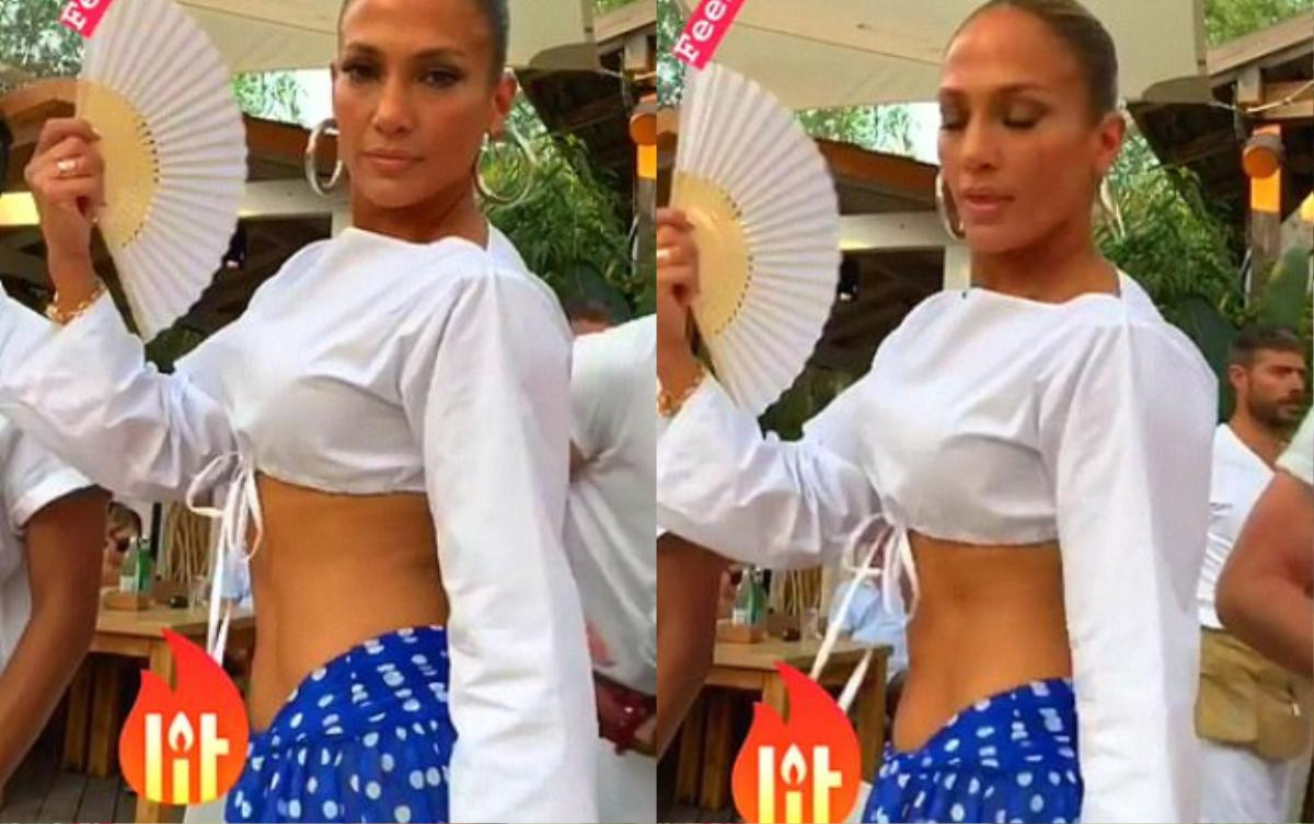 Jennifer Lopez mặc váy chấm bi xẻ đến tận hông khoe cơ bụng rắn chắc đến gái trẻ cũng thua Ảnh 4