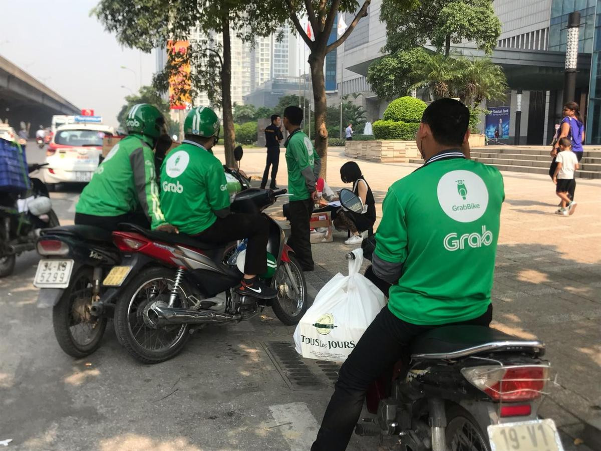 Nỗi niềm sinh viên chạy xe ôm công nghệ: 'Làm nghề này ai cũng ít nhất một lần bị khách quỵt tiền, đối diện với nguy hiểm' Ảnh 1