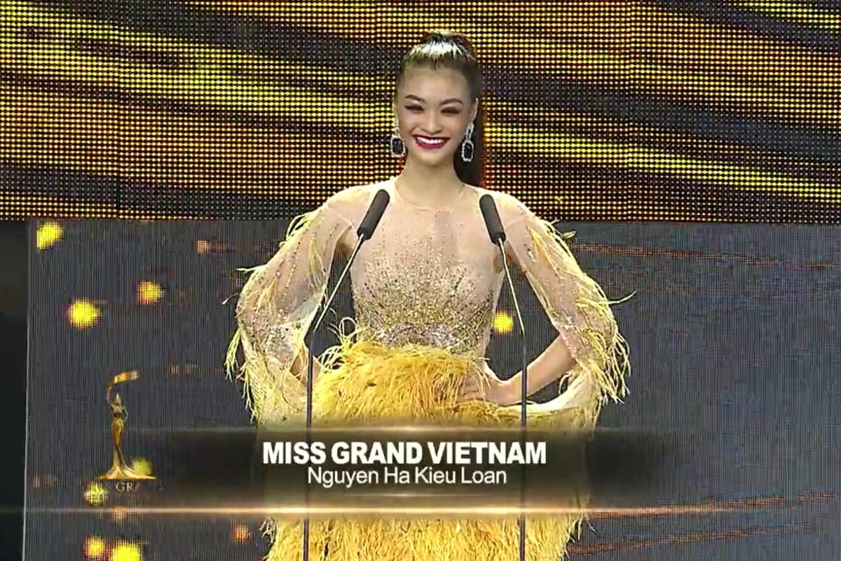 Bán kết Miss Grand: Kiều Loan đẹp rạng rỡ, tự hào hô 'Việt Nam', catwalk với Pant Gown 'siêu chất' Ảnh 1