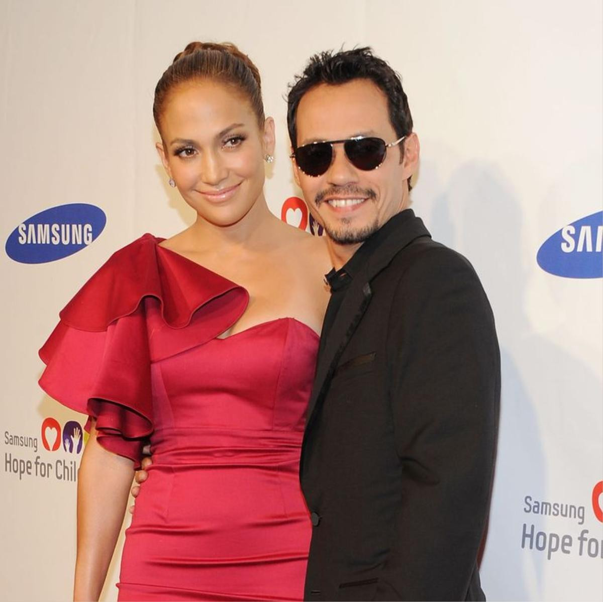 Jennifer Lopez và Marc Anthony ly dị 8 năm vẫn ‘tình bể bình’ Ảnh 1