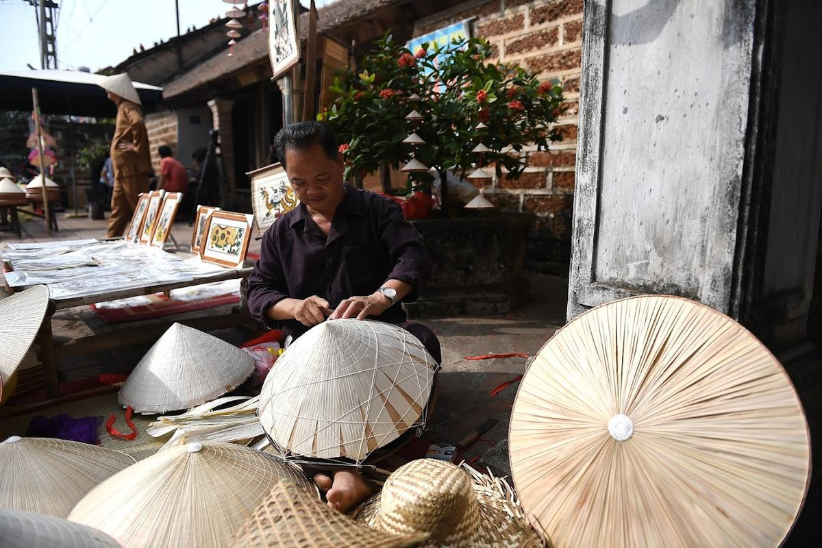 Tết làng Việt 2024 tại Làng cổ Đường Lâm: Chuyến 'xuyên không' trở về nhịp Tết xưa Ảnh 6