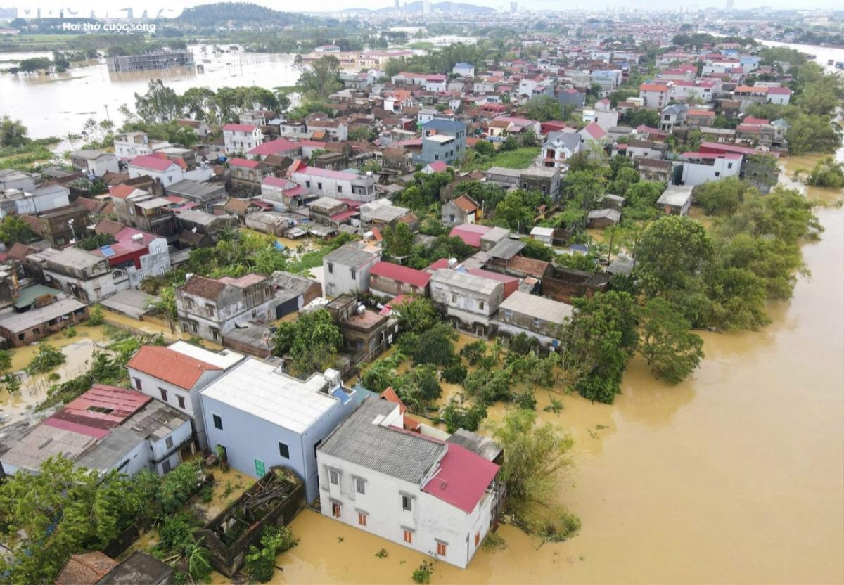 9.000 người dân Bắc Giang bị cô lập trong đêm khi sông Cầu dâng lũ lớn nhất trong 40 năm Ảnh 2