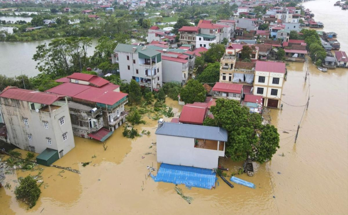 9.000 người dân Bắc Giang bị cô lập trong đêm khi sông Cầu dâng lũ lớn nhất trong 40 năm Ảnh 4