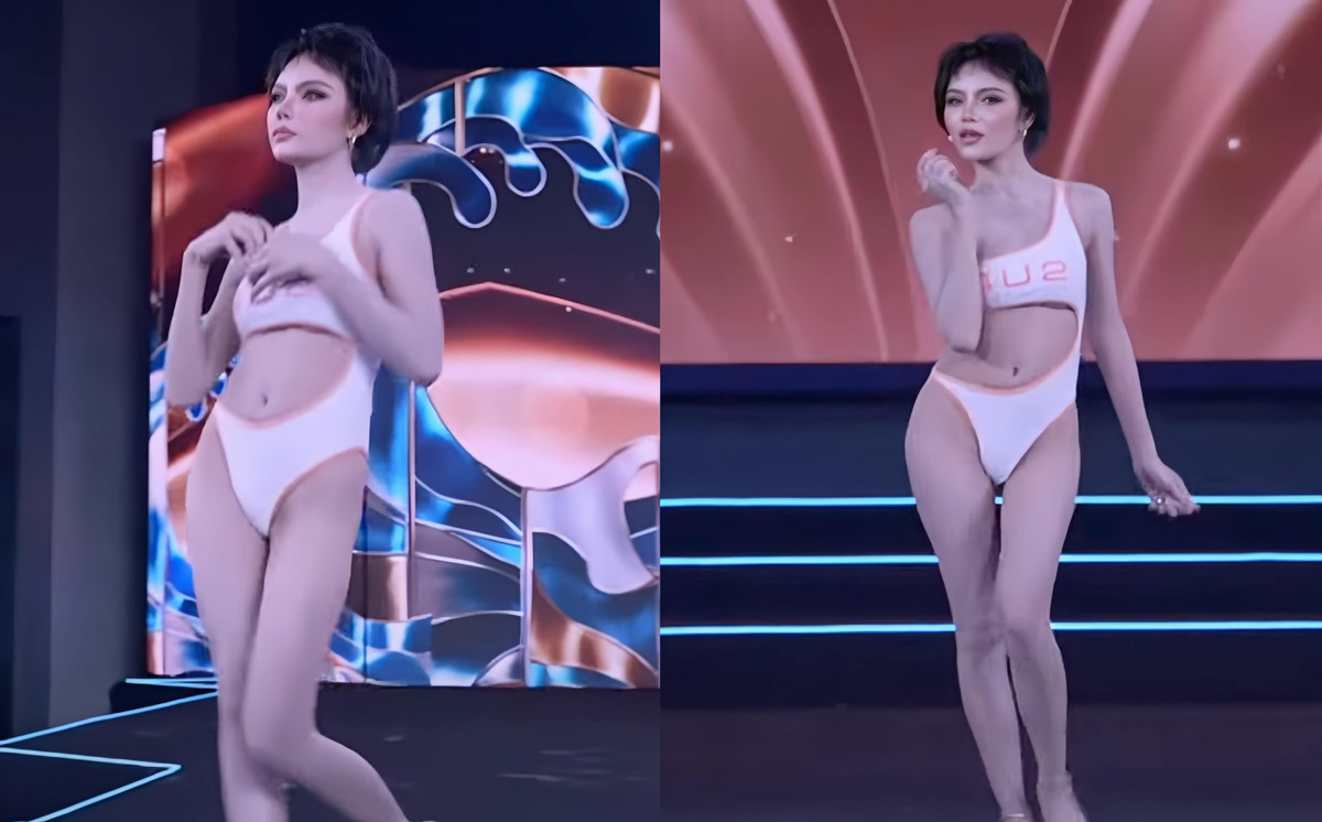 Đại diện Samut Songkhram gây chú ý khi nhét son ở vòng 1, vô tư lấy son ra và tô lên môi khi trình diễn. (Ảnh chụp màn hình)