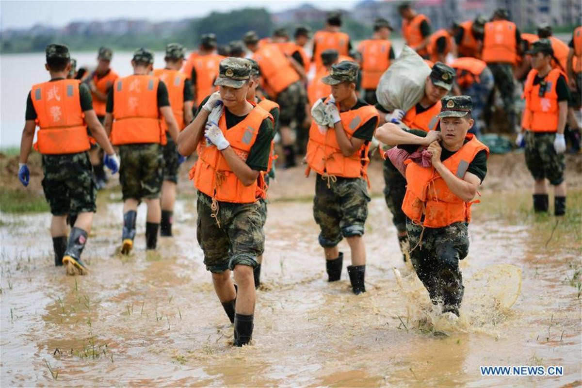 Hồ nước ngọt lớn nhất Trung Quốc vượt đỉnh đại hồng thủy 1998, 1 tỉnh vỡ 14 đê ban bố tình trạng thời chiến Ảnh 11