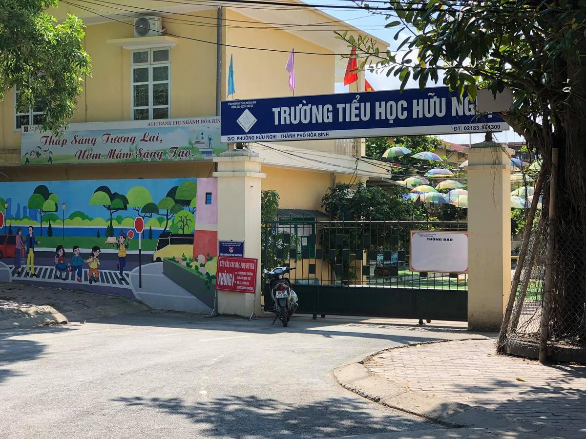 Vợ người đàn ông hành hung bé trai 7 tuổi chấn thương: Chồng tôi chỉ tát cháu sưng mồm thôi Ảnh 2