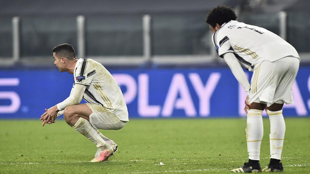 Ronaldo bất lực nhìn Juventus bị loại ở vòng knock-out Champions League Ảnh 1