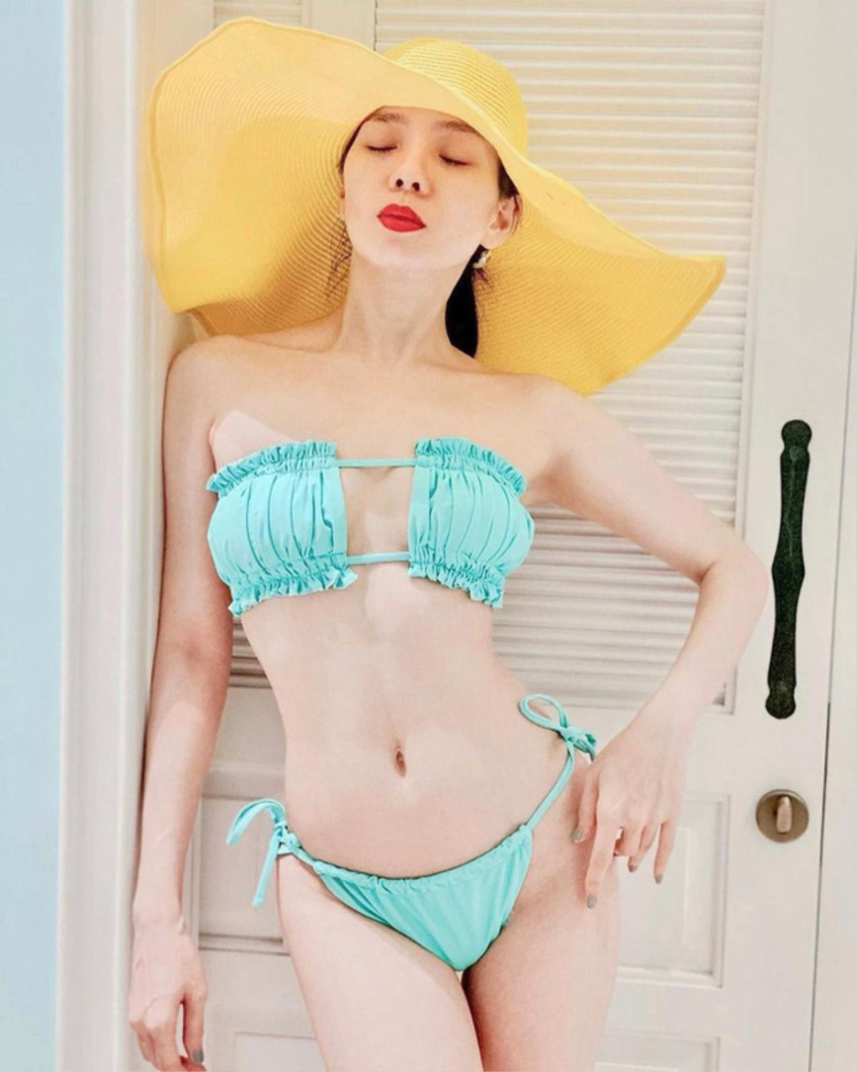 Lệ Quyên thả dáng bốc lửa cùng bikini hổ báo, hông quả táo, eo con ong khoe hết ra Ảnh 4