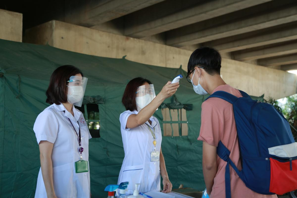 Sáng 31/7: Hà Nội ghi nhận 23 ca dương tính mới với SARS-CoV-2, trong đó 8 ca tại khu cách ly Ảnh 1