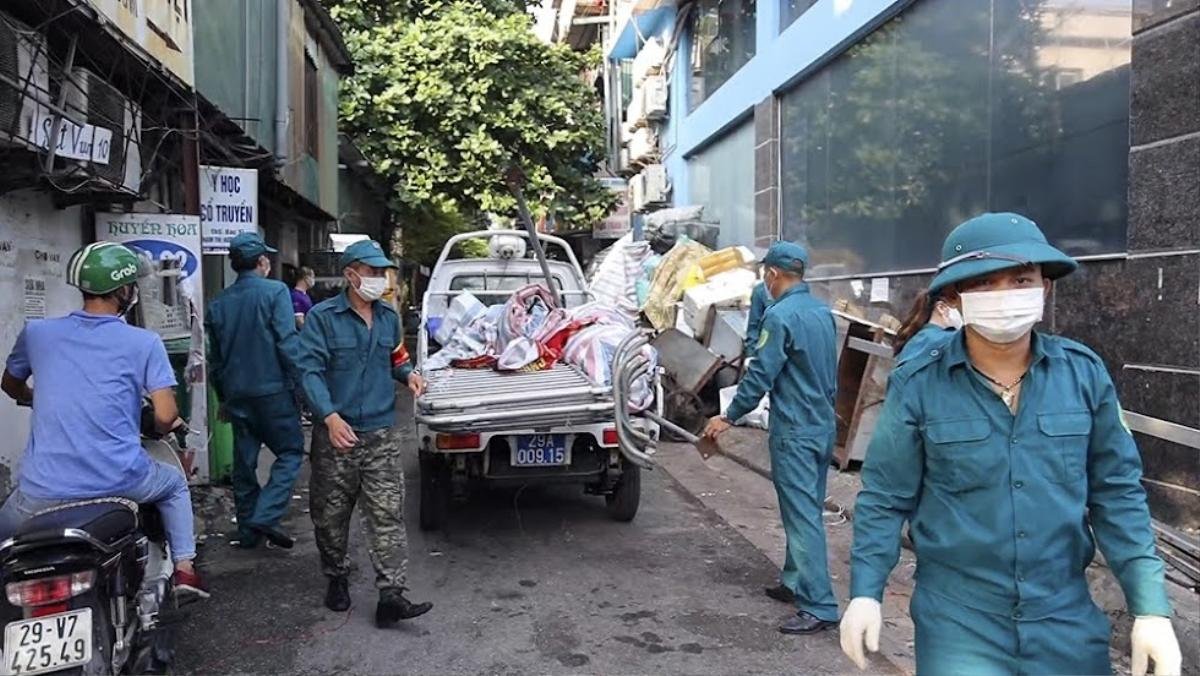 Hà Nội nới lỏng giãn cách, các chốt 'vùng xanh' tại các khu dân cư giờ hoạt động ra sao? Ảnh 4