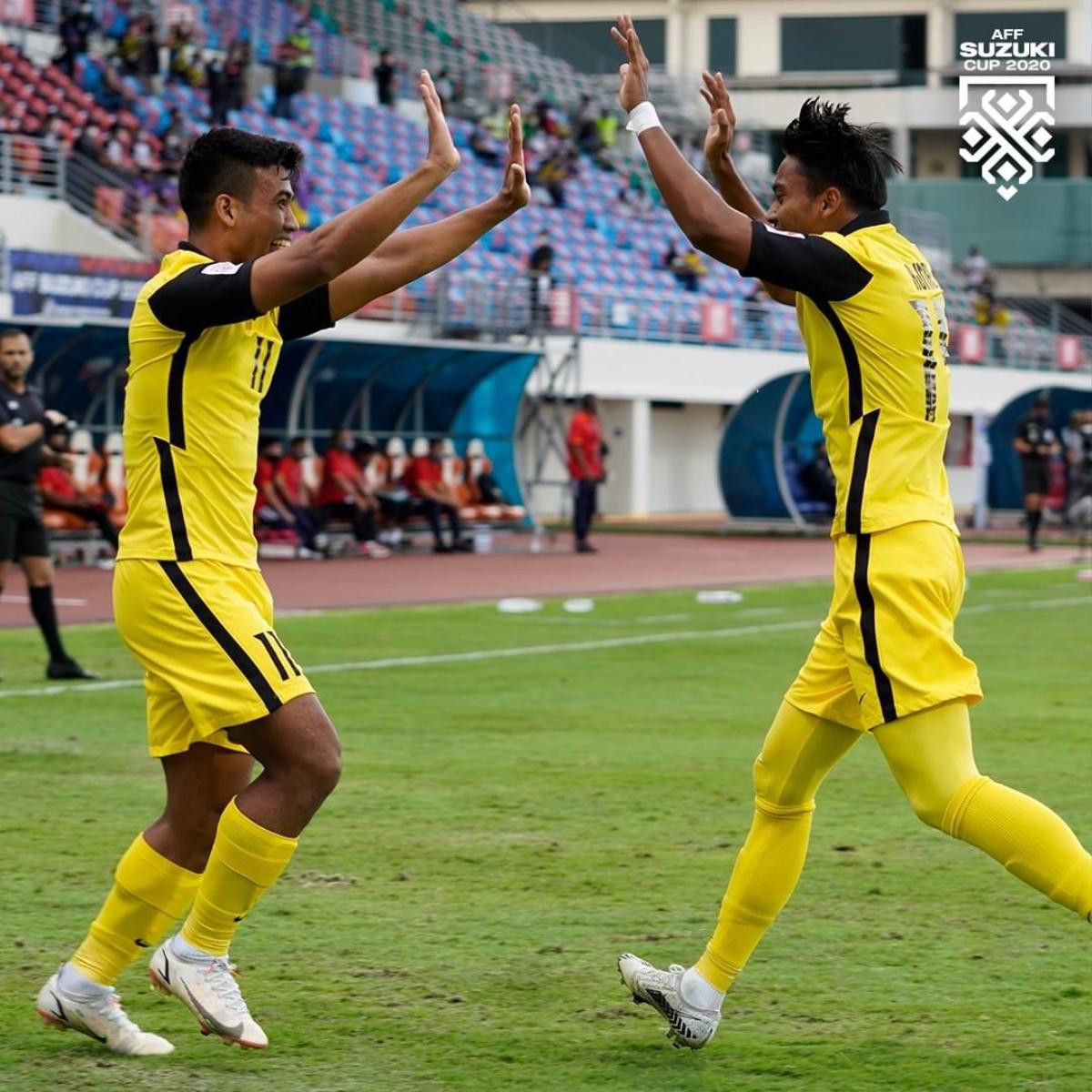 Đè bẹp Lào 4-0, Malaysia tạo ép lớn cho tuyển Việt Nam! Ảnh 1