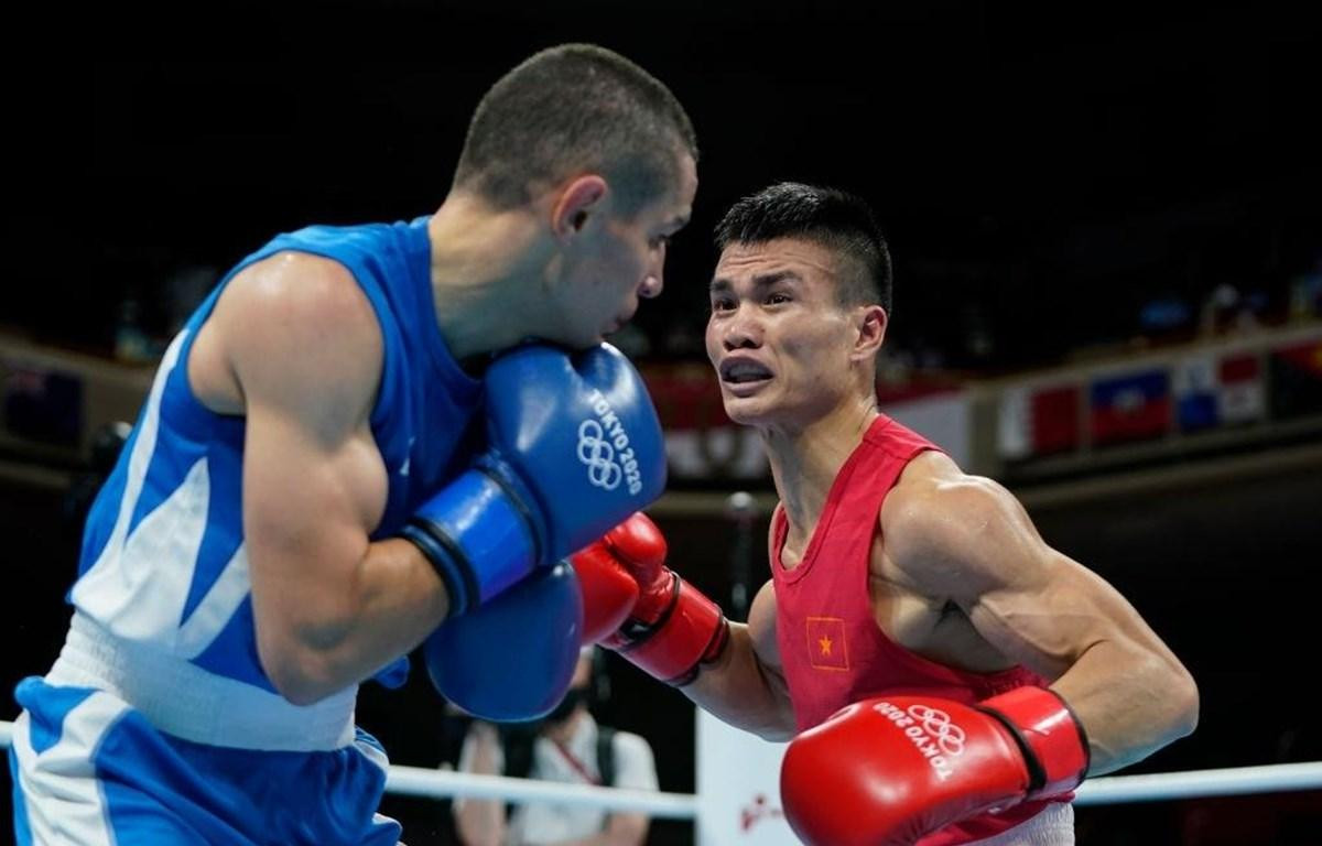 Hai tay đấm boxing chuyên nghiệp sẽ bước lên võ đài The Champion Ảnh 1