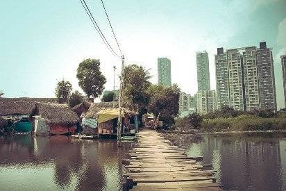 Cuộc sống tạm bợ của người dân xóm nhà lá giữa lòng Sài Gòn Ảnh 2