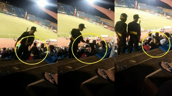 Cảnh sát cơ động thẳng tay tát nữ cổ động viên trên khán đài Ảnh 2